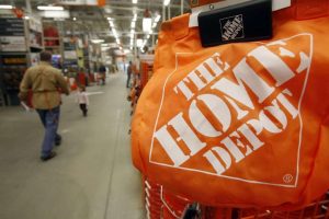 FILE - In this Feb. 22, 2010 file photo, shoppers walk through the aisles at the Home Depot store in Williston, Vt. The Home Depot on Thursday, Sept. 18, 2014 said it has eliminated malware from its U.S. and Canadian networks that affected 56 million unique payment cards between April and September. (AP Photo/Toby Talbot, File) ORG XMIT: NYBZ102